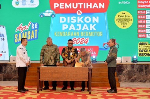 Penandatanganan Perjanjian Kerja Sama antara Pemerintah Provinsi Sumatera Utara dan Pemerintah Kabupaten/Kota yang diselenggarakan oleh Badan Pendapatan Daerah Provinsi Sumatera Utara